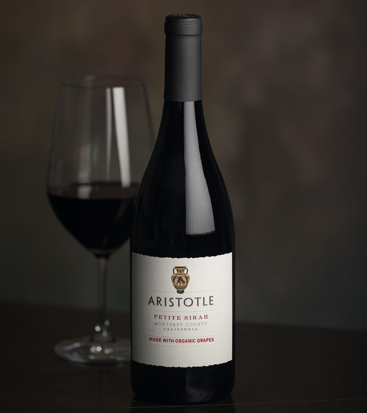 Aristotle Wine bottle and glass